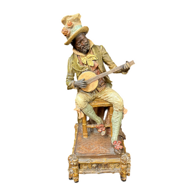 Figura francesa en terracota policromada hombre tocando el banjo Bucarest Art & Antiques