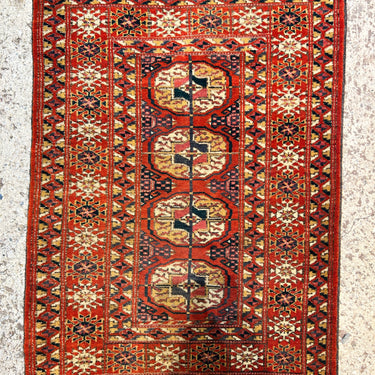 Alfombra Iraní Tekke bokhara tonos naranjos 100x60cm