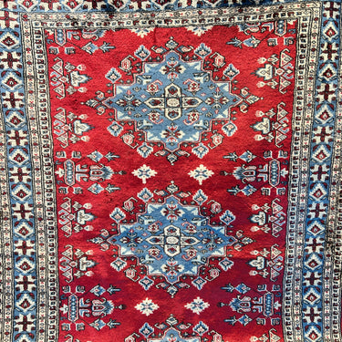 Alfombra Iraní Ghom lana y seda tonos rojo y azul 180x127cm