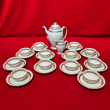Juego de té de porcelana francesa banda dorada marca P.L para 12 personas