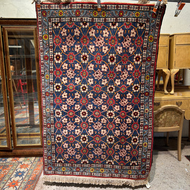 Alfombra persa Veramine en lana motivos florales 102x152cm