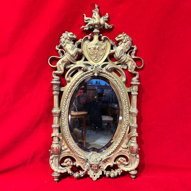 Espejo francés en bronce con decoración heráldica de leones fin s. XIX